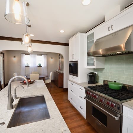 Traditional Kitchen with Arched Drywall and Original Molding