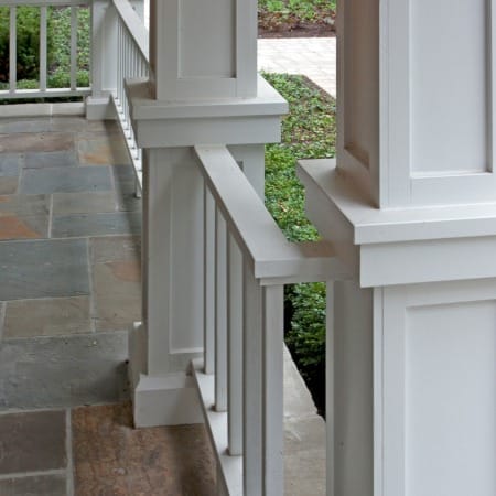 Blue Stone Porch with White Railings
