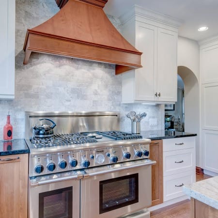 Copper Hood with Professional Grade Double Oven, Six Burners and Griddle