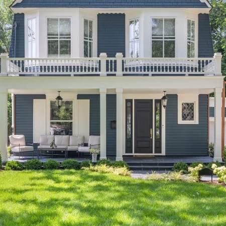 White Shutters and Copper Downspouts