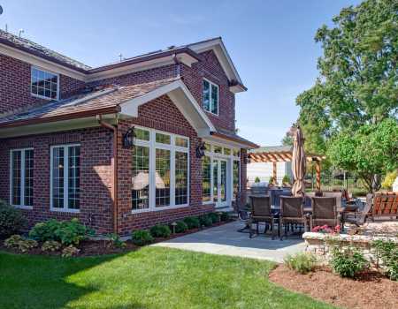 Red Brick and Beautiful Window with French Patio Doors