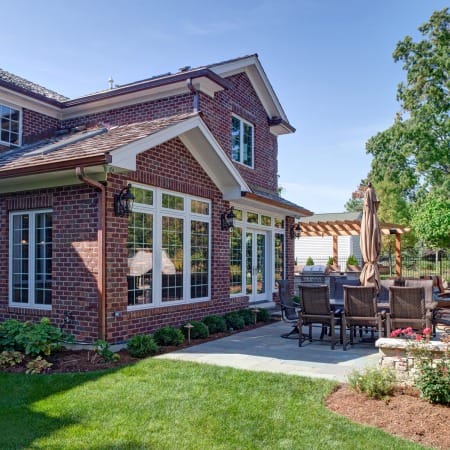 Red Brick and Beautiful Window with French Patio Doors