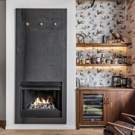 Wood Burning Fireplace Place with Expose Beams on the Ceiling