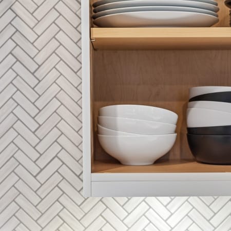 White Herringbone Tile Backsplash