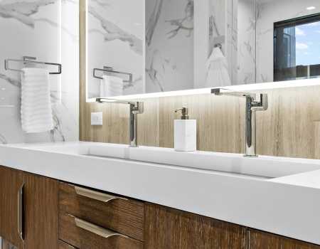 Two Faucets with an Extra Long Single Sink Basin