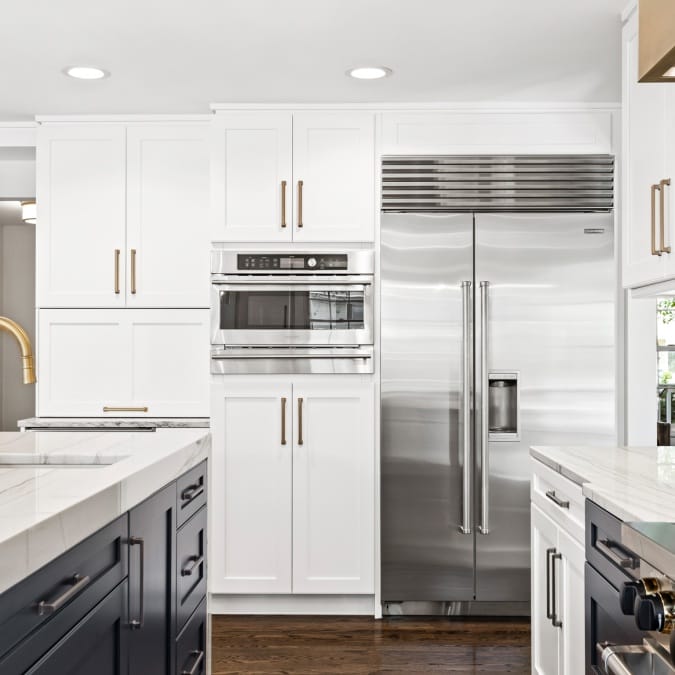 Full Height Appliance Wall with Built-In Refrigerator, Microwave, and Wine Chiller