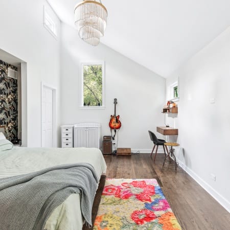 Pitched Ceiling with Gold Chandelier