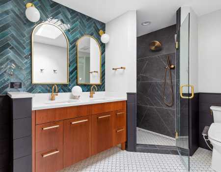 Teal Herringbone Subway Tile Backsplash and Gold Finishes