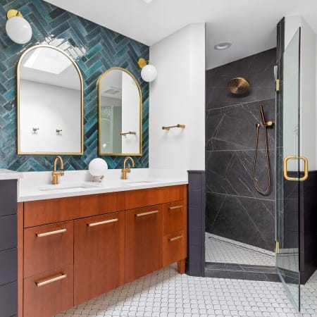 Teal Herringbone Subway Tile Backsplash and Gold Finishes