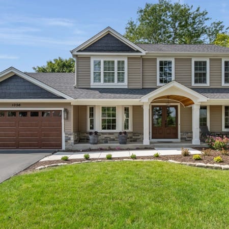 Craftsman Style Wooden Garage Door Stained in Rich Honey