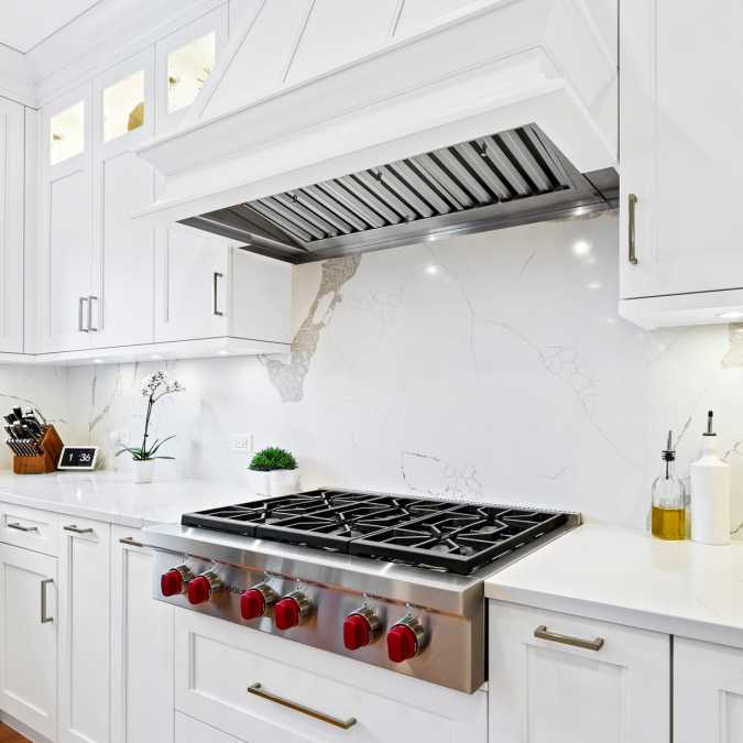 Six burner range with storage below