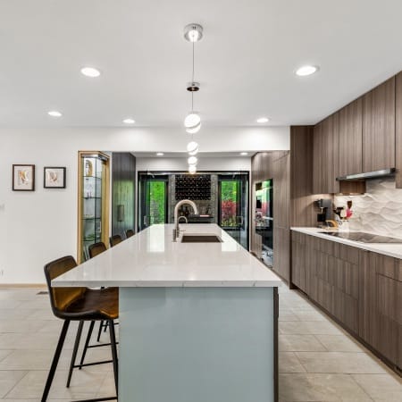 Side Angle View of Kitchen Island and Wine Cellar