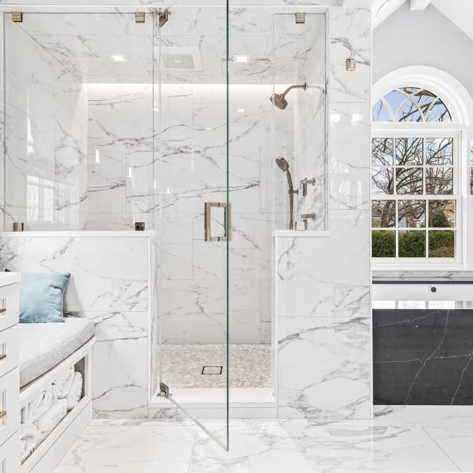 Shower with adjacent tub