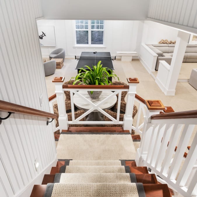 Staircase with Bead Board Wooden Wall Paneling