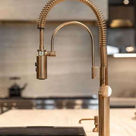 Multi-functional island sink faucet