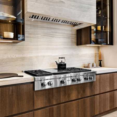 Professional rangetop and custom Neolith stone fume hood