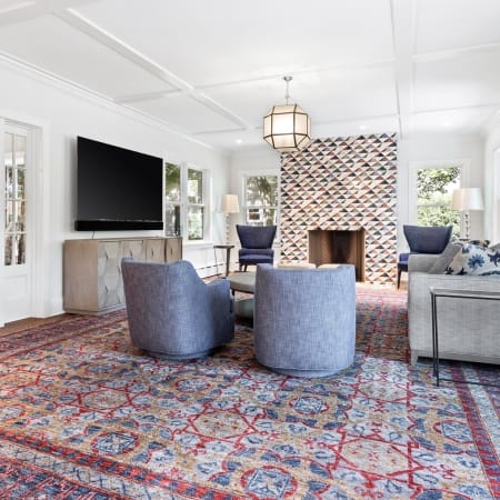 Wide Angle of Living Room with Custom Wood Burning Fireplace and Accent Ceiling