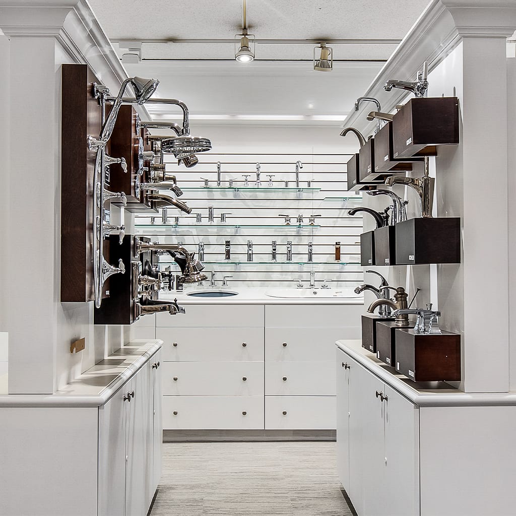 Organized white pantry with jars